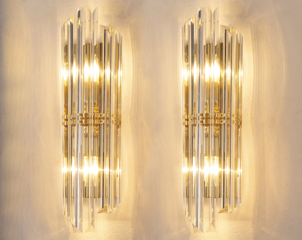 Pair of SoloCoseBelle Murano glass wall sconces with clear accent lamps, made in Italy, featuring elegant design and refined craftsmanship.