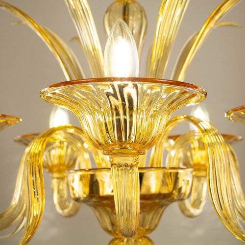 Amber Murano glass five-arm chandelier — central lamp cup and glass leaves