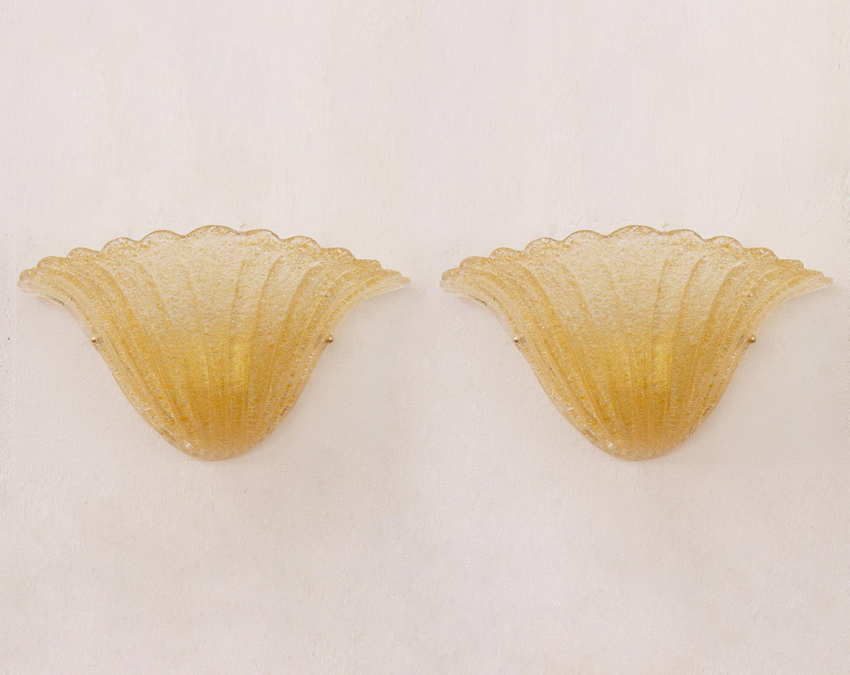 Pair of amber Murano glass shell wall sconces with graniglia texture, front view