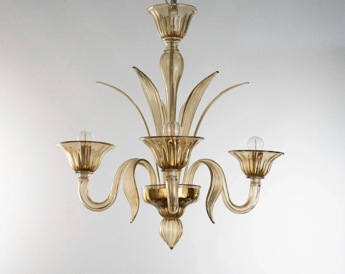 Amber Murano glass three-arm chandelier — full view of curved glass arms