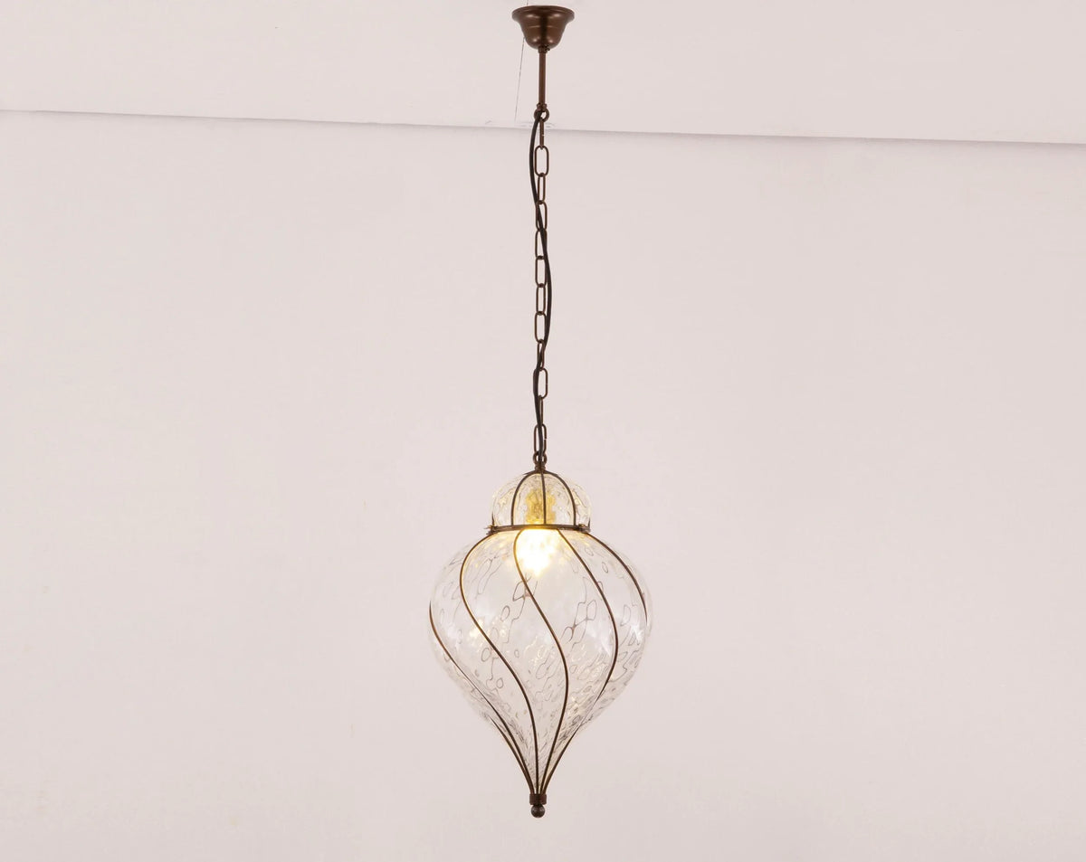 Clear Murano glass lantern pendant — illuminated front view