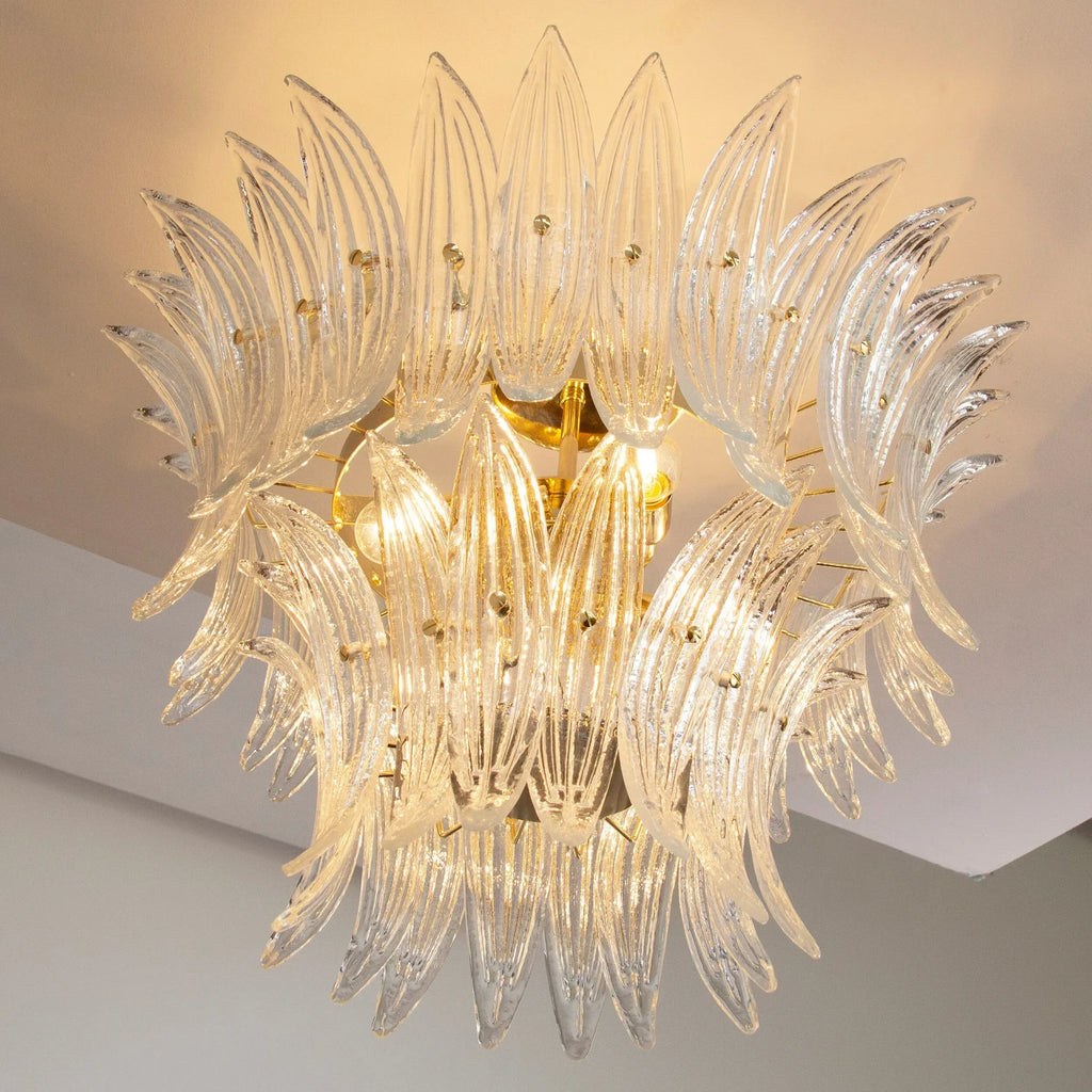 Clear Murano glass leaf ceiling lamp — illuminated angled view