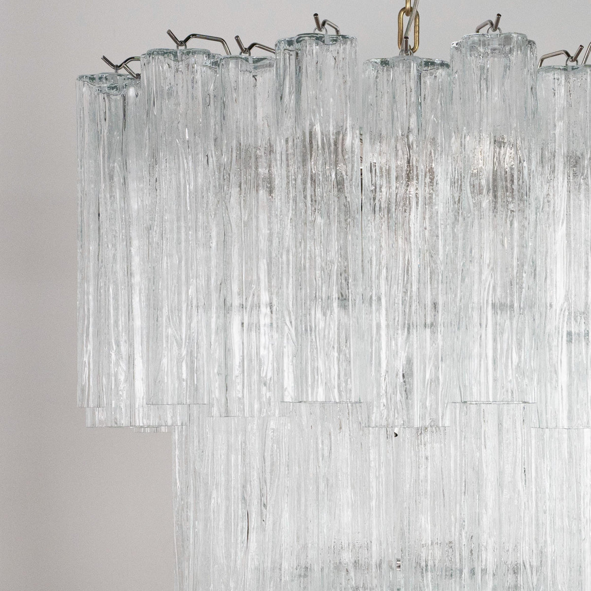 Clear Tronchi Murano glass chandelier — close-up of upper glass tubes