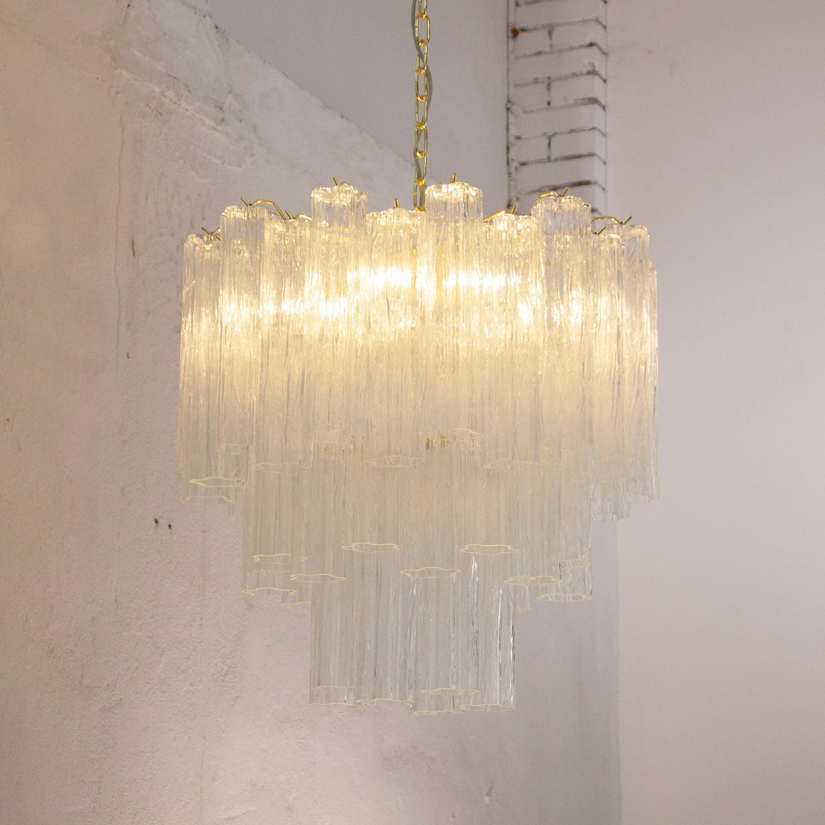 Clear Tronchi Murano glass chandelier — illuminated front view