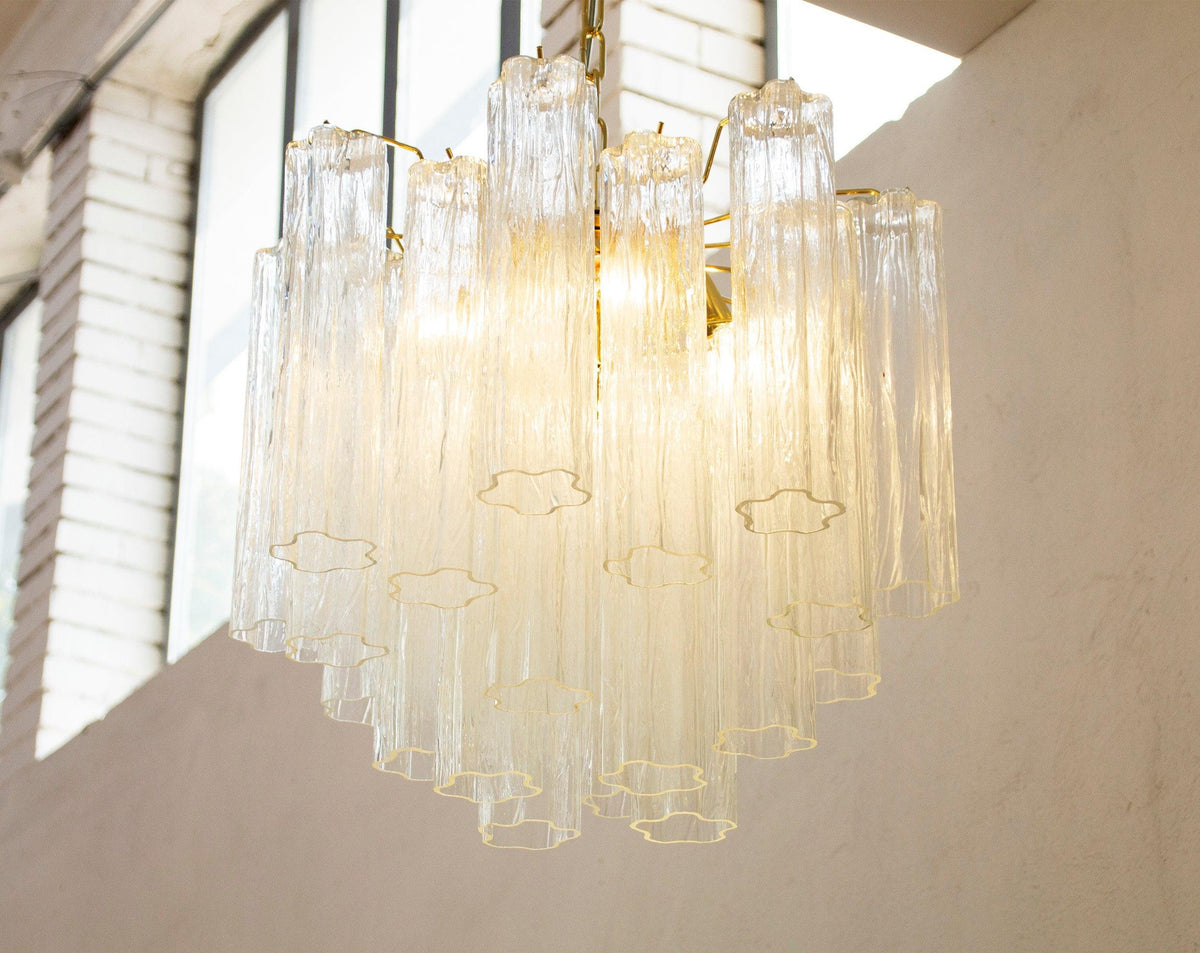 Clear Tronchi Murano glass chandelier — illuminated glass tubes