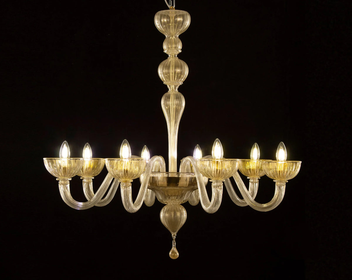 Gold-toned Murano glass eight-arm chandelier — illuminated full view