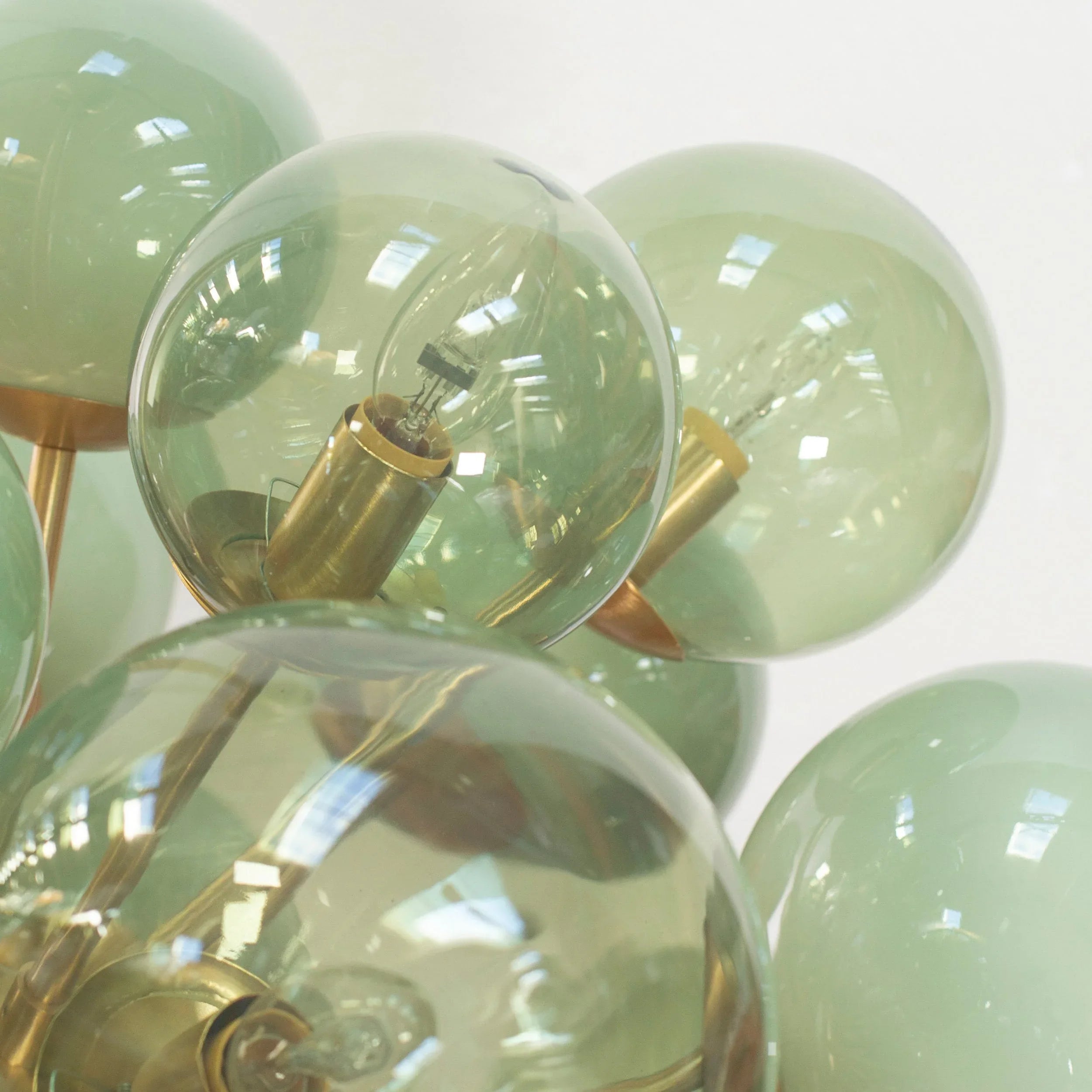 Suspension chandelier with mixed green Murano blown glass spheres - SoloCoseBelle