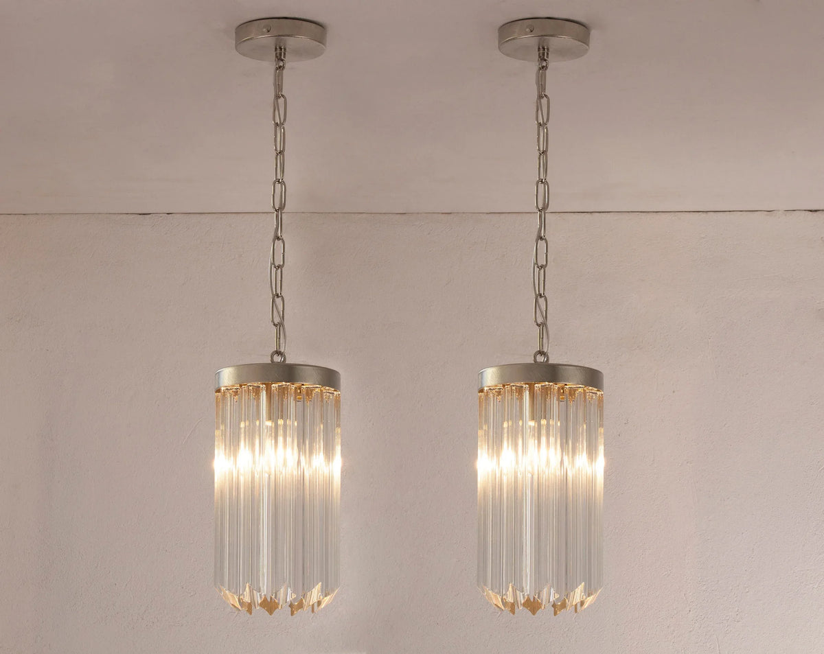 Pair of illuminated Quadriedri Murano glass pendant lights with nickel frames