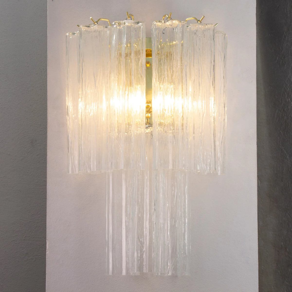 Large clear Tronchi Murano glass wall sconce — unlit front view