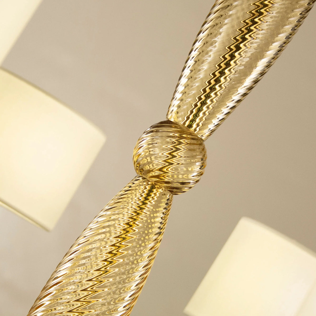 Murano glass chandelier with ivory lampshades — twisted glass stem close-up