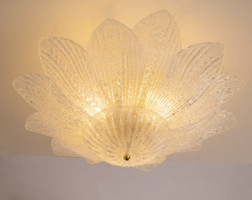 Clear Murano glass leaf ceiling lamp with graniglia texture, lit, front view