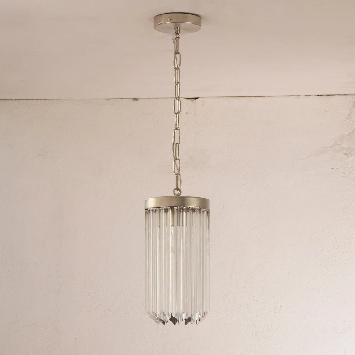 Quadriedri pendant light with suspension chain and ceiling rose