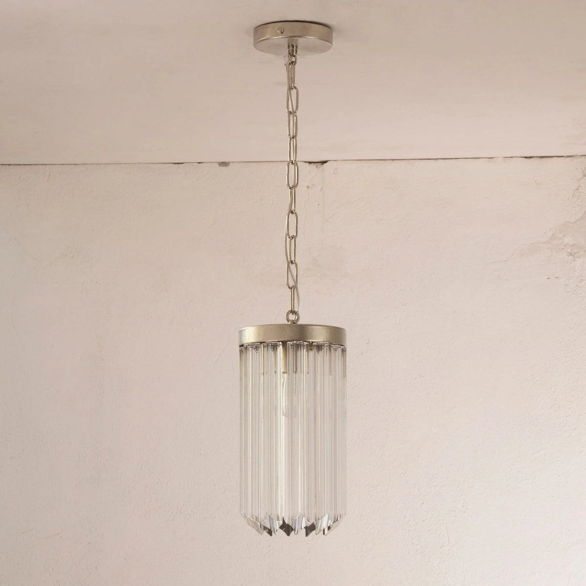 Quadriedri pendant light with suspension chain and ceiling rose
