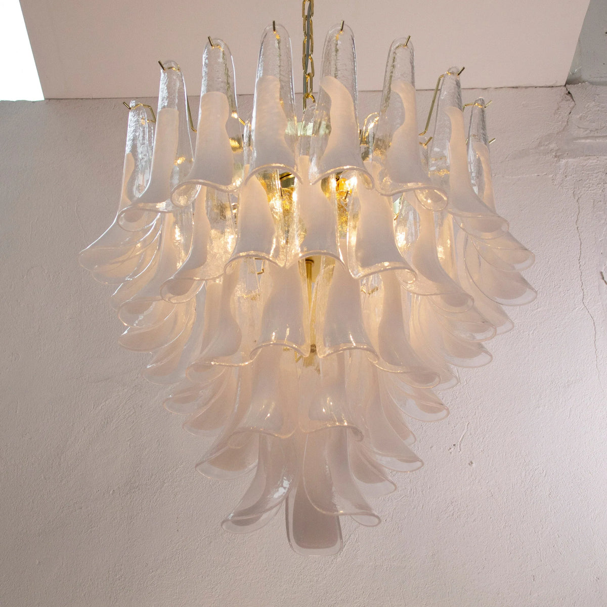 Petali Murano glass chandelier — illuminated, viewed from below