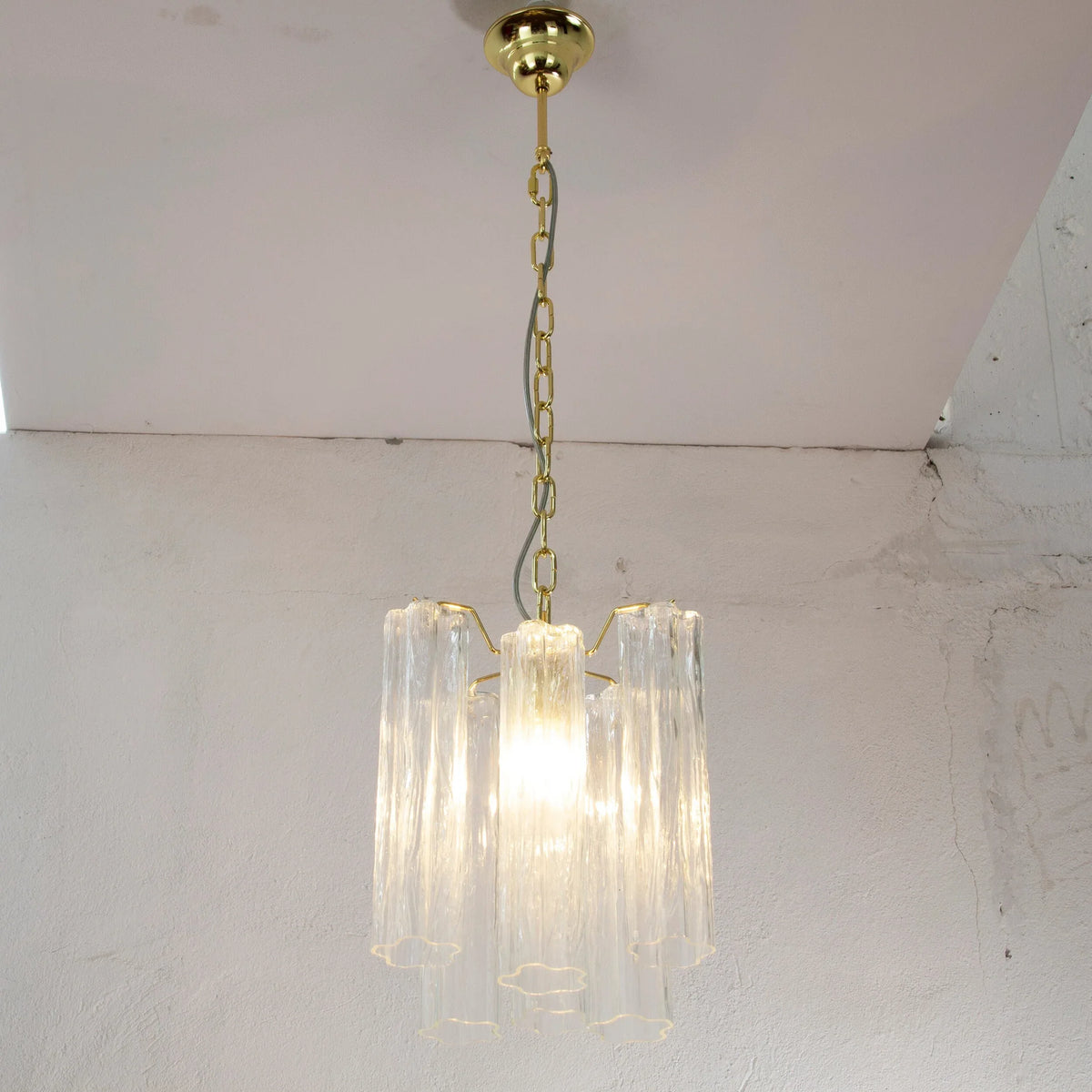 Small clear Tronchi Murano glass pendant light — angled view with suspension chain