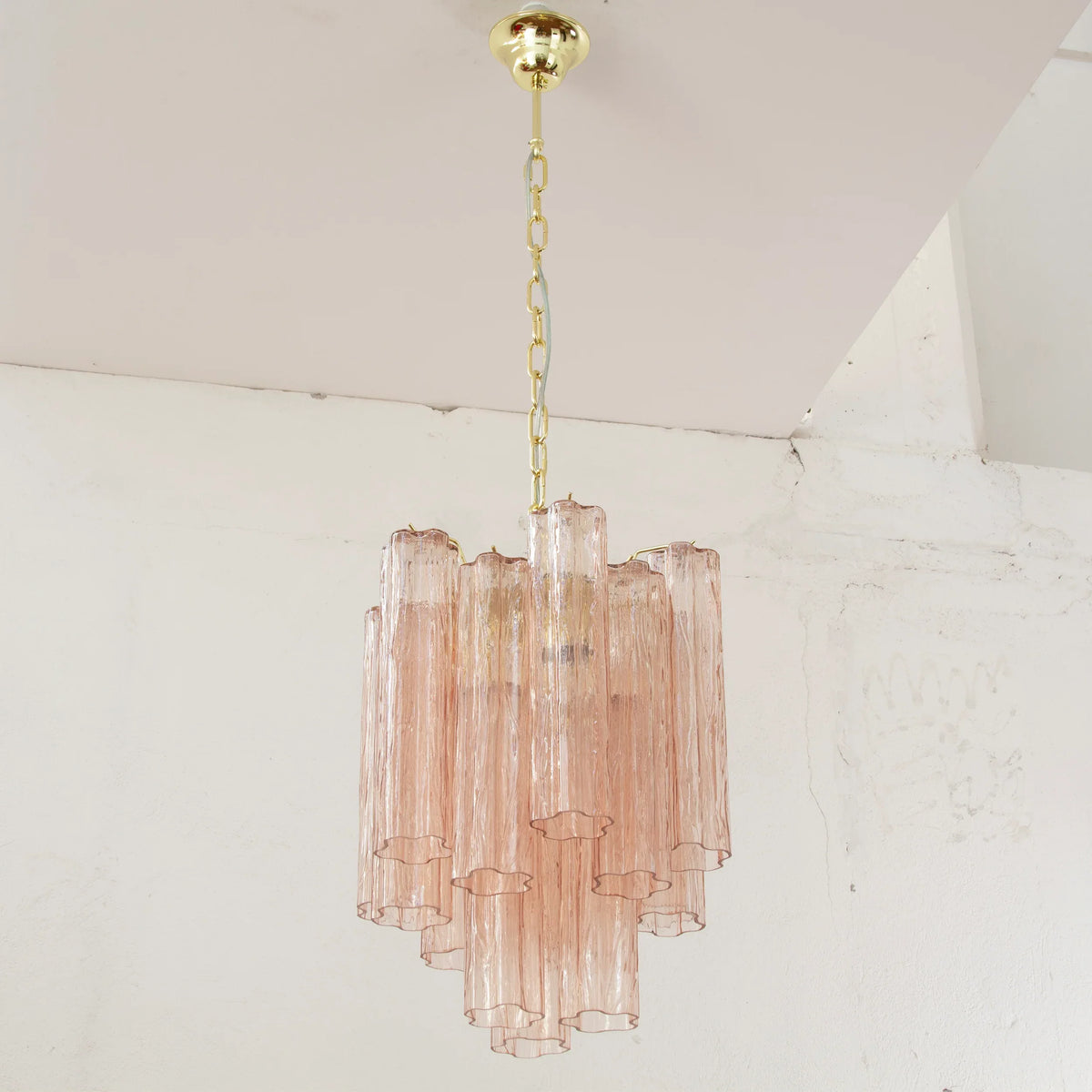 Tronchi Murano glass pendant light — pink glass illuminated